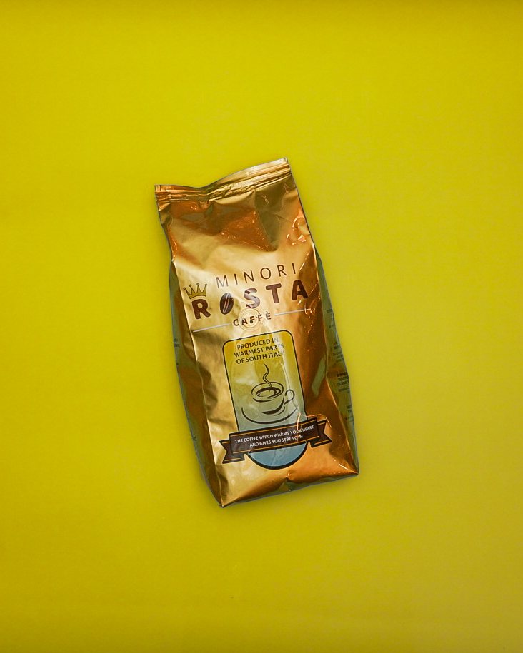 A gold bag of Minori Rosta coffee beans