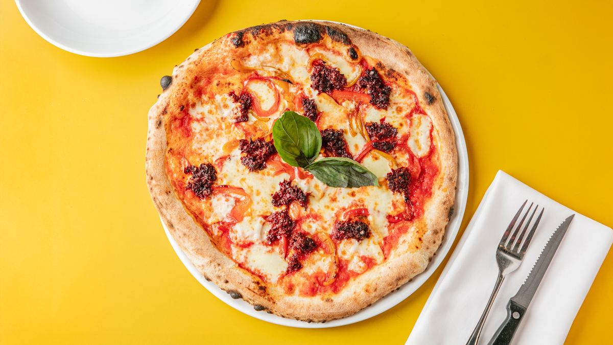 Nduja pizza with basil